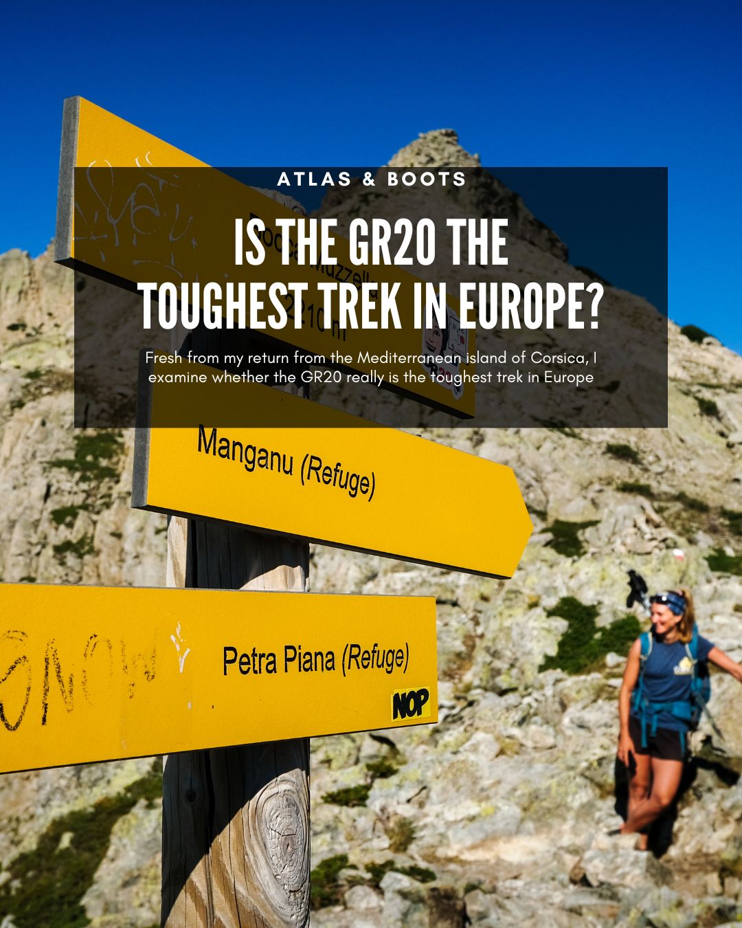 yellow trail sign on the GR20 with an exhausted hiker