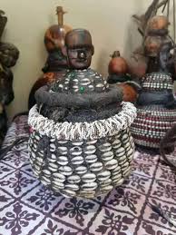 container with sangoma bids around it