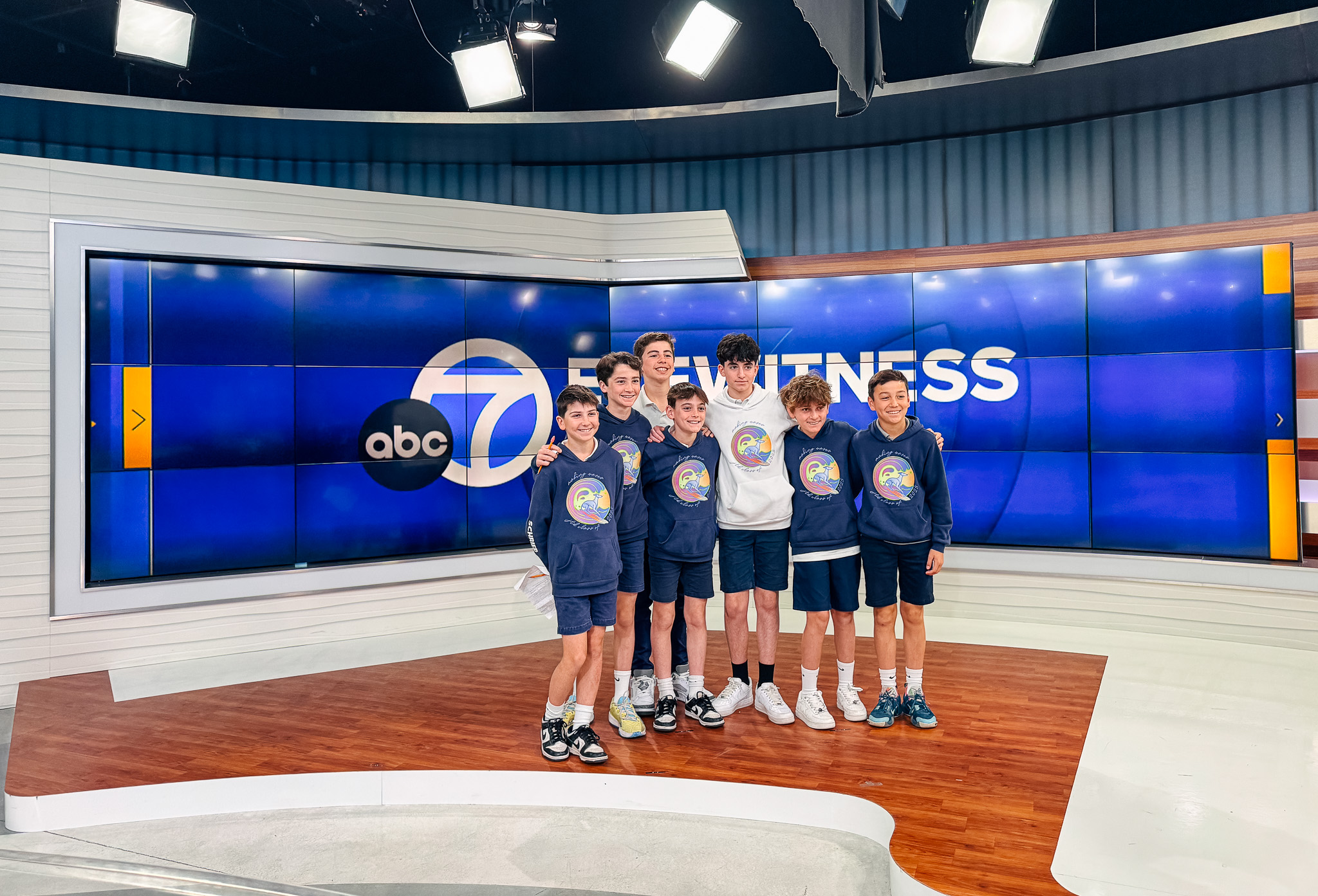 Grade 6 Students pose for a photo in ABC7 News Studio while visiting for Career Day