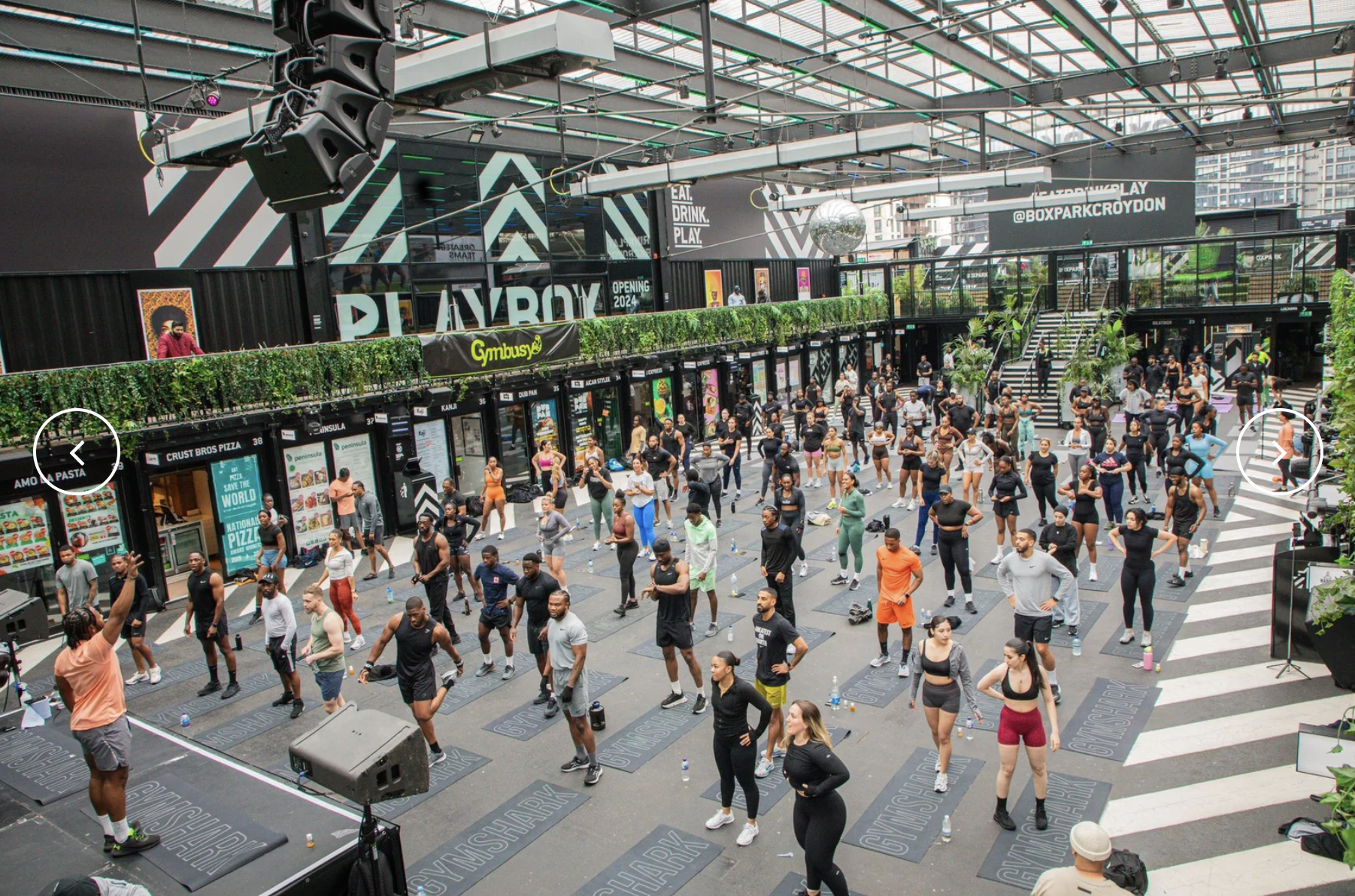 crowd of people at fitness event in boxpark 